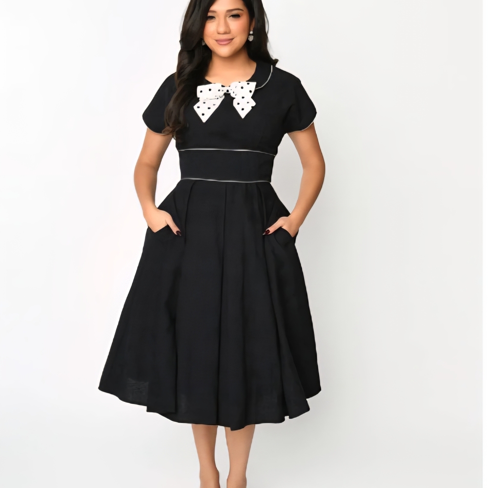 Unique Vintage Black Midi Dress with Polka Dot Bow